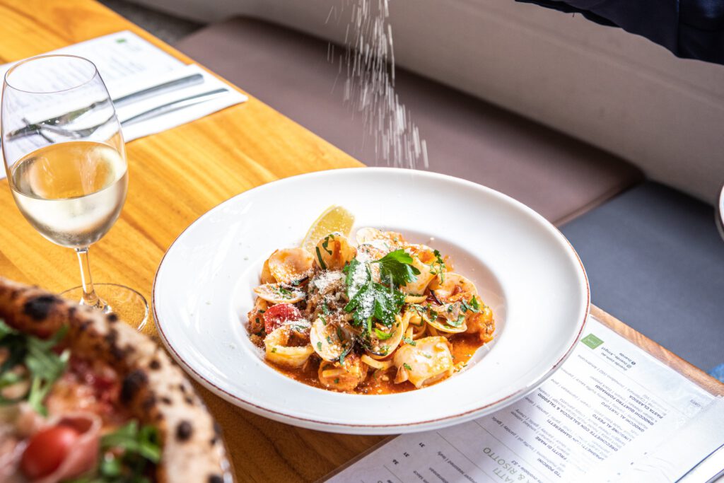 Seafood pasta with calamari and tomato sugo at Il Verde Italian restaurant in Bowen Hills Brisbane