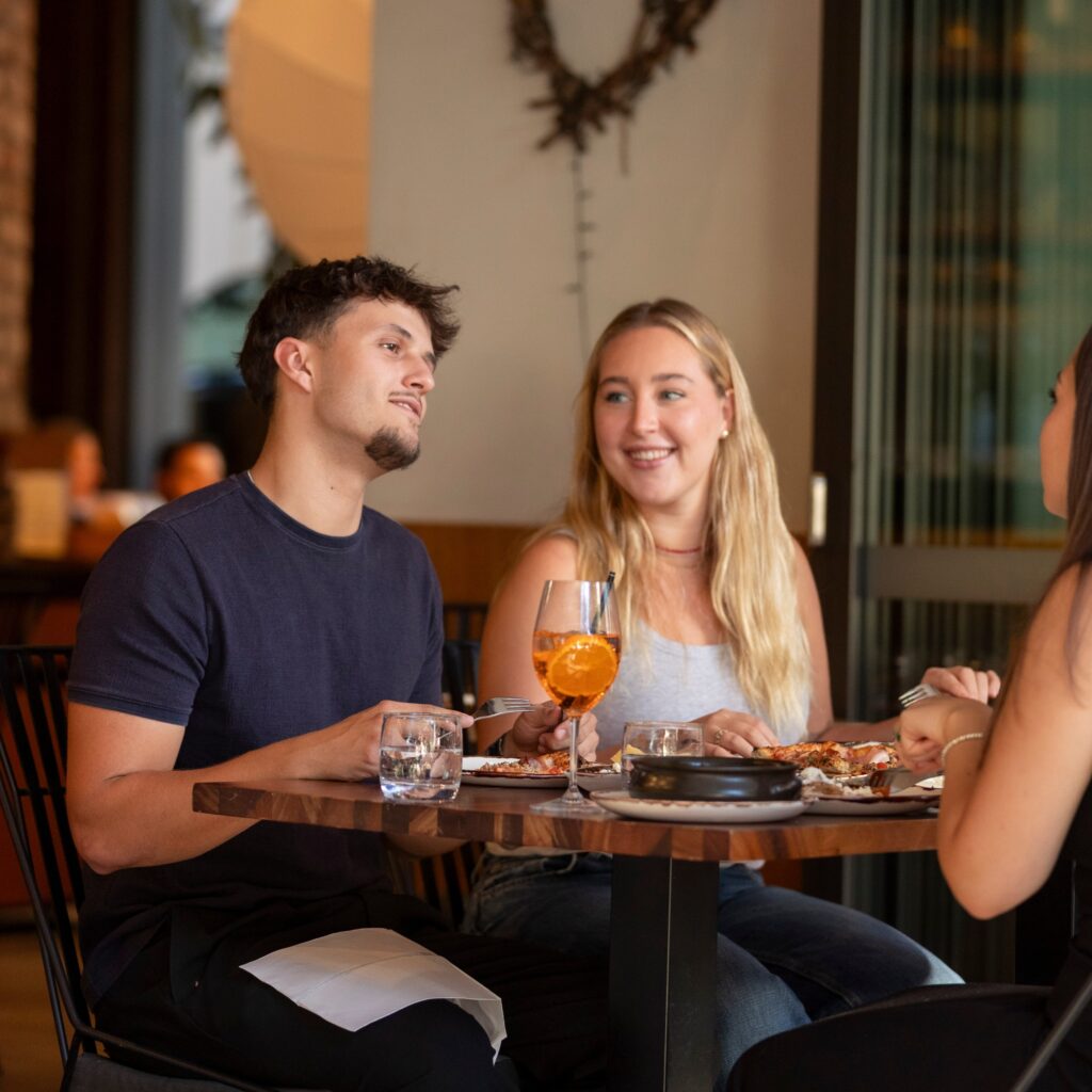 Friends enjoying Italian dinner and cocktails at Il Verde restaurant in Bowen Hills Brisbane