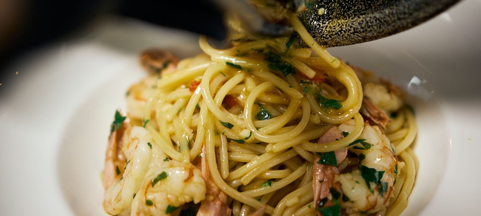 Fresh prawn spaghetti pasta served at Il Verde Italian restaurant on King Street in Bowen Hills Brisbane