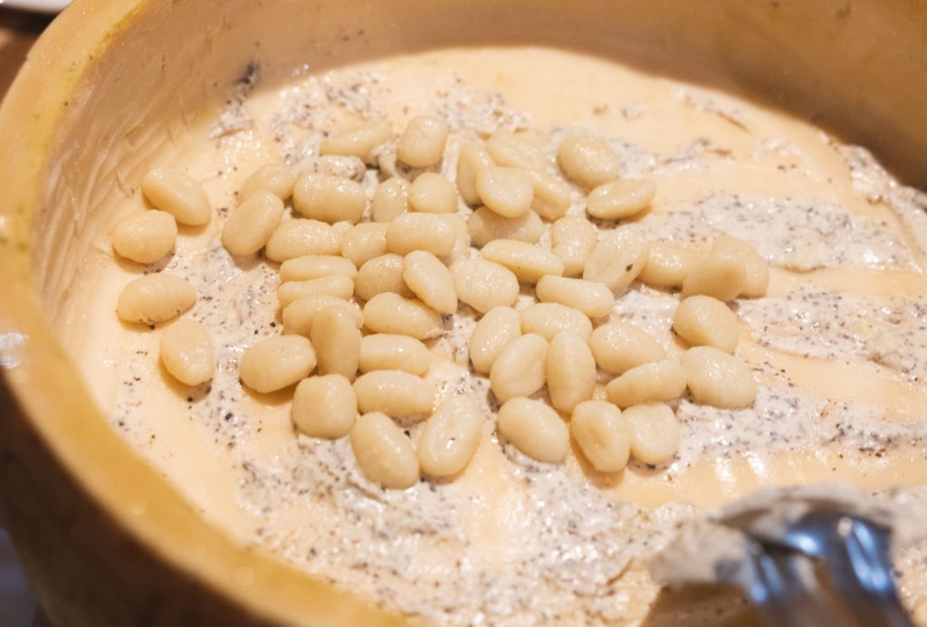 Gnocchi tossed inside a Grana Padano cheese wheel at Il Verde in Bowen Hills Brisbane